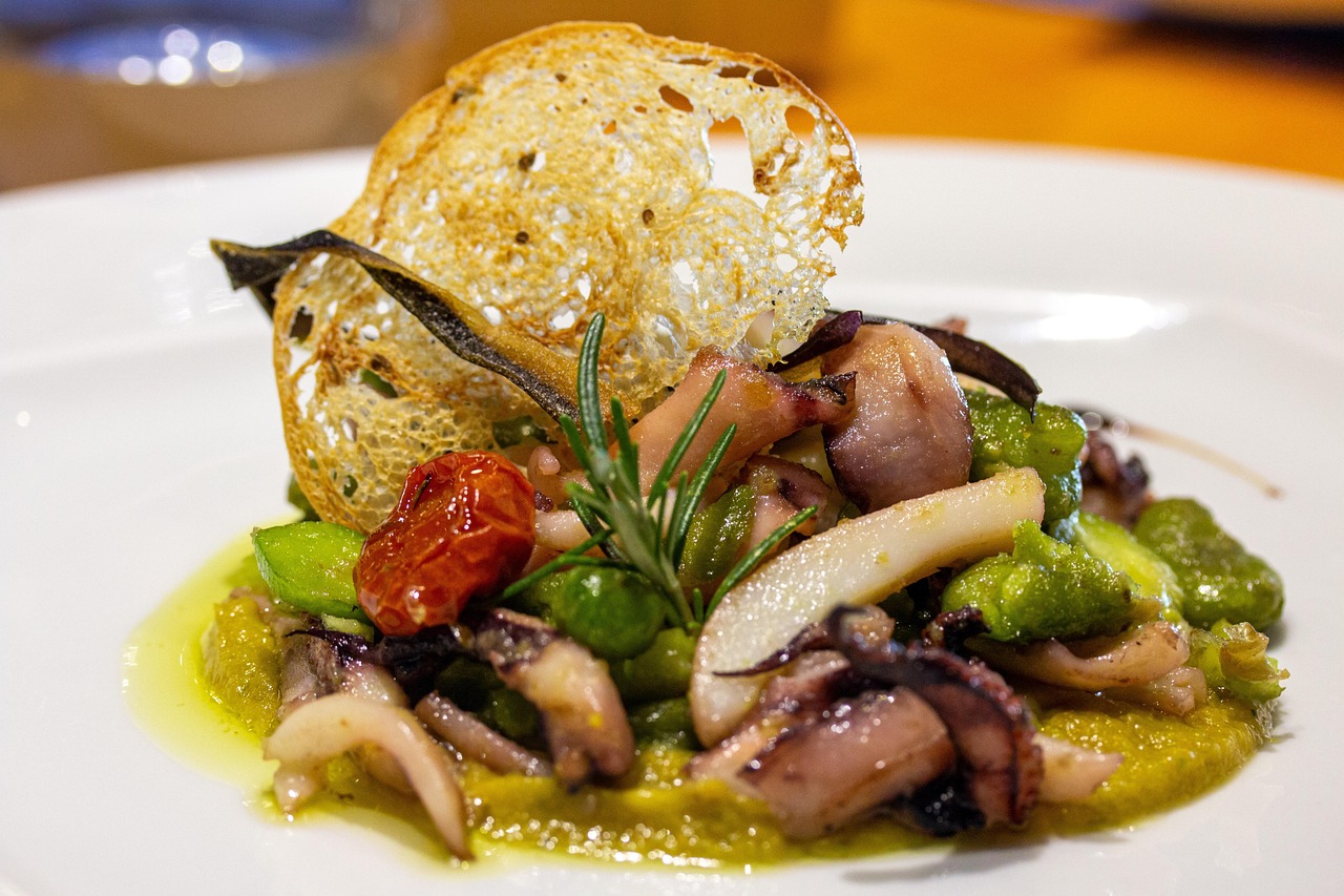 Immagine di piatti tipici veneti serviti in un ristorante premiato.